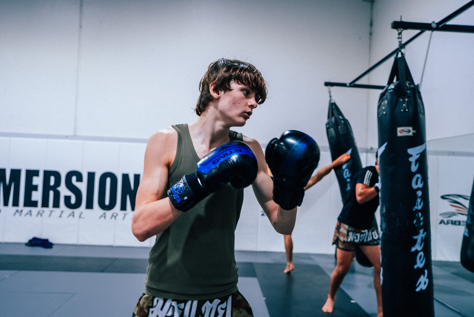 Student keeping his hands up between bag rounds